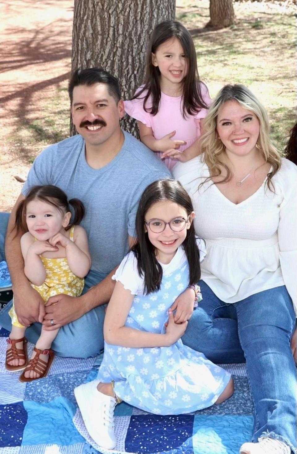 Samantha Gonzalez with husband Alonzo and daughters Adalyn, 8, Madison, 5, and Mallory, 2.