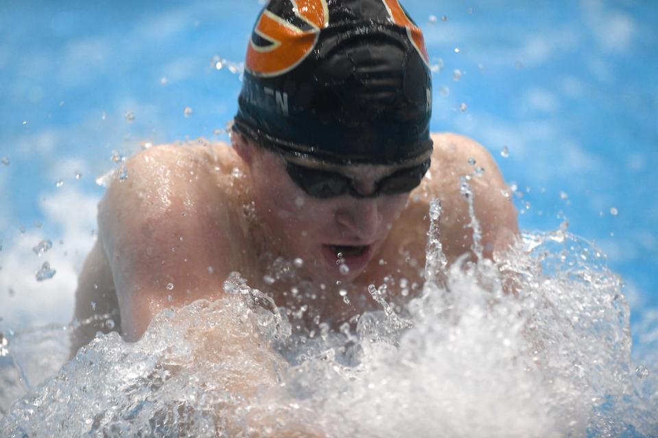 Green’s Seth McMillen competes in the boys 200-yard medley relay in the Division I district meet at Cleveland State, Saturday, Feb. 17, 2024.