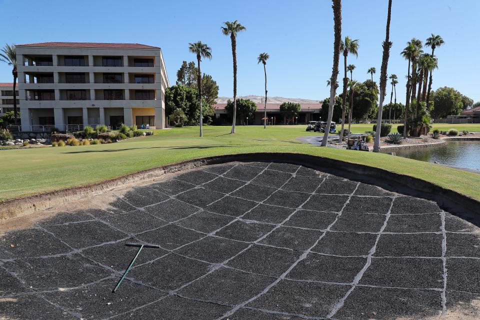 A black-rubberized liner is showing in a bunker on the 9th hole of the Lagos course at Desert Princess because of a shortage of bunker sand at the Cathedral City golf course, September 19, 2022. 