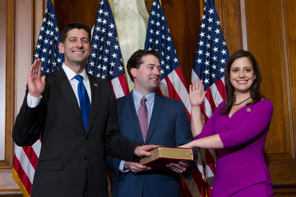 Former House Speaker Paul Ryan administers the House oath of office to Elise Stefanik during a mock swearing in ceremony on Capitol Hill in Washington, Jan. 3, 2017, as the 115th Congress began.<span class="copyright">Jose Luis Magana—AP</span>