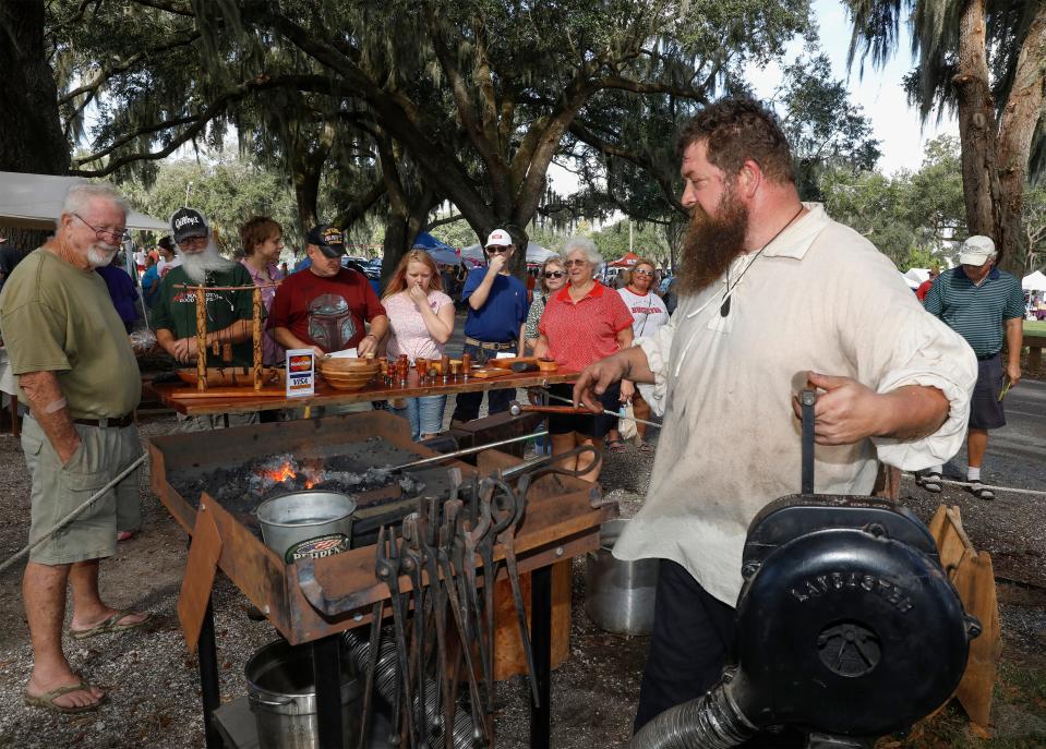 Thomas Geer heats a piece of metal as he demonstrates the art of blacksmithing during the Pioneer Days Festival in 2019. The annual festival is Saturday and Sunday in Lake Wales.