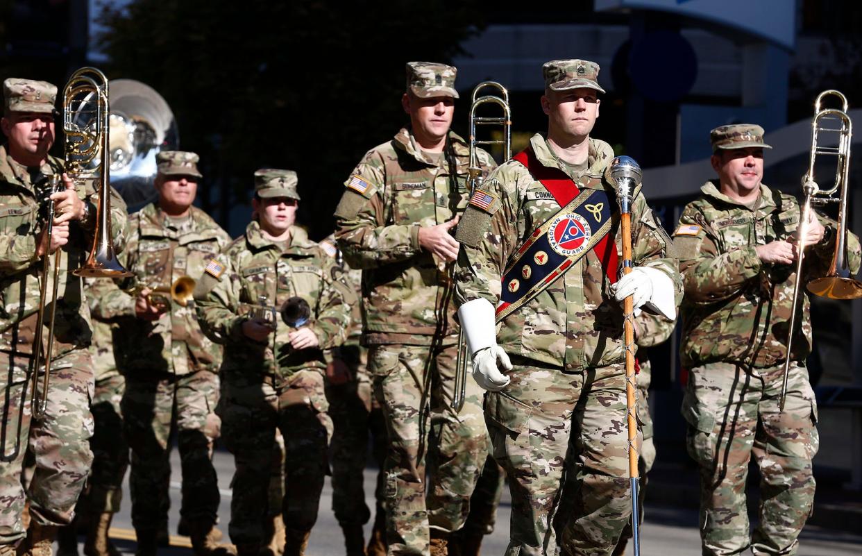 The band of the Ohio Army National Guard marches in the 2021 Central Ohio Veterans Day Parade on North High Street Downtown. There are numerous discounts available locally to current and former members of the military on Veterans Day.