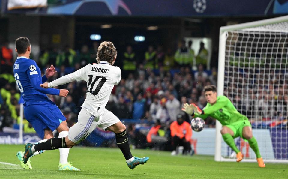 Real Madrid's Croatian midfielder Luka Modric shoots but fails to score during the Champions League quarter-final second-leg football match between Chelsea and Real Madrid - GLYN KIRK/AFP via Getty Images