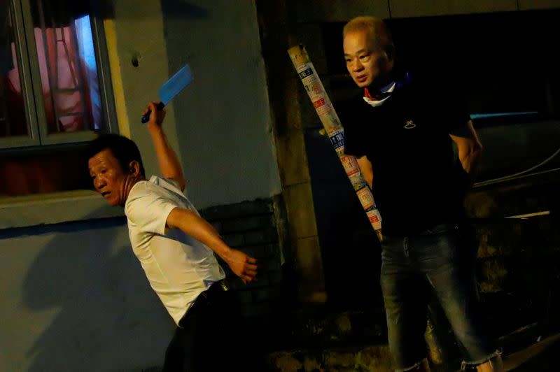 Pictures of the Year: Hong Kong protest tide turns into sea of flames