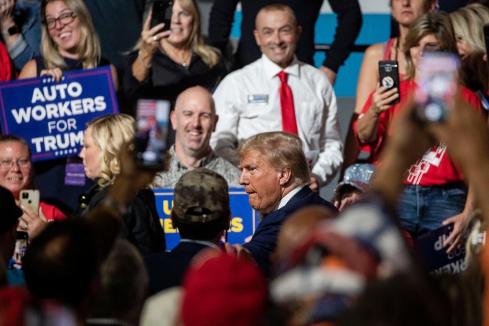 Former President Donald Trump greets supporters after speaking at Drake Enterprise in Clinton Twp. on Wednesday, Sept. 27, 2023.