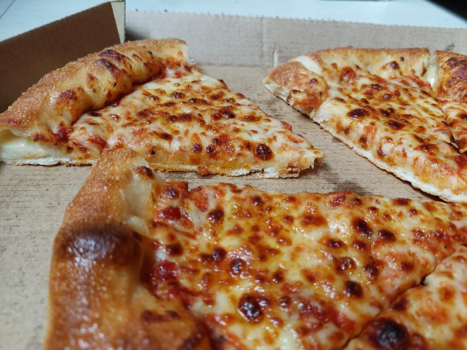Slices of pizza from Pizza Hut, displayed in a box