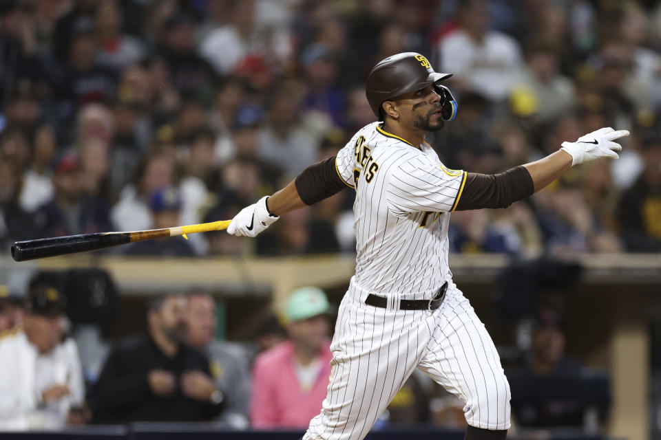 San Diego Padres' Xander Bogaerts watches his RBI double against the Cleveland Guardians in the fifth inning of a baseball game Tuesday, June 13, 2023, in San Diego. Manny Machado scored on the play. (AP Photo/Derrick Tuskan)