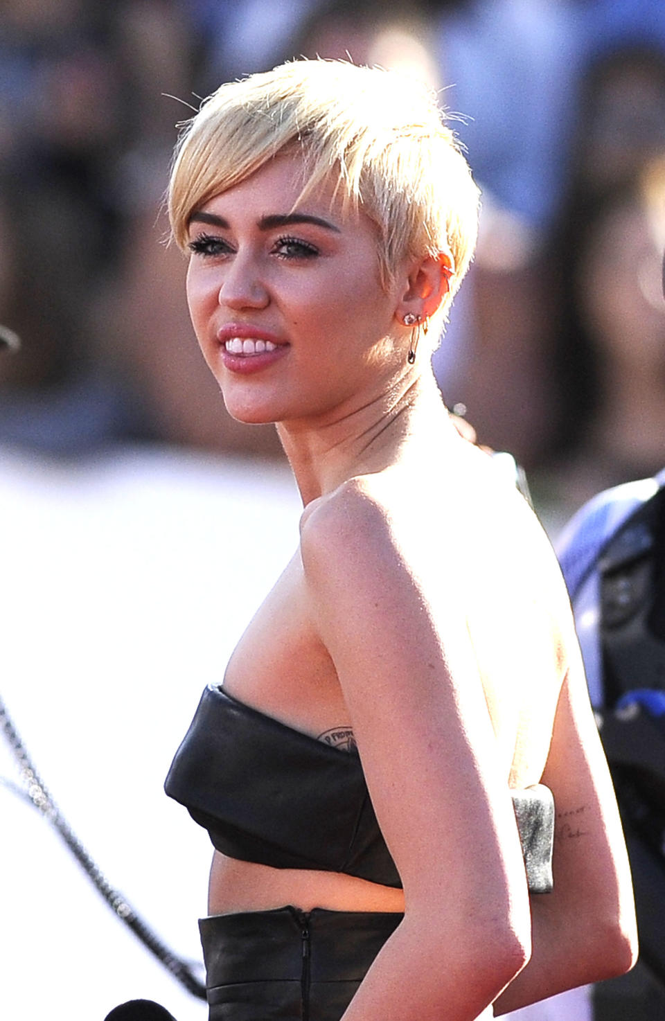 Close-up of Miley in a bandeau top
