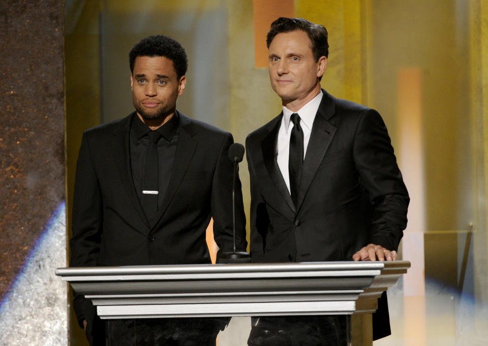 Michael Ealy, left, and Tony Goldwyn speak on stage at the 45th NAACP Image Awards at the Pasadena Civic Auditorium on Saturday, Feb. 22, 2014, in Pasadena, Calif. (Photo by Chris Pizzello/Invision/AP)