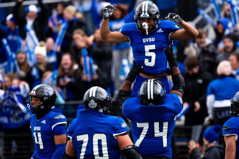 GVSU's Cody Tierney celebrates a touchdown with his teammates Saturday, Oct. 14, 2023, at GVSU.