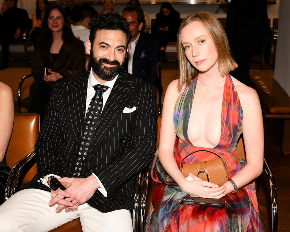 Morgan Spector and Hannah Einbinder sit front row at Ralph Lauren's fall/holiday 2024 show on April 29, 2024.
