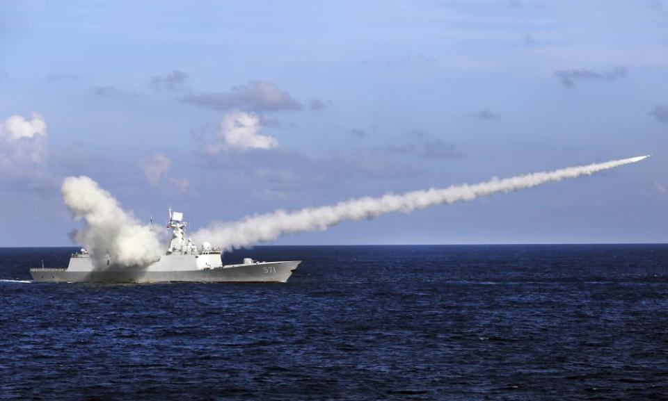 A Chinese frigate launches a missile during a 2016 military exercise in the South China Sea