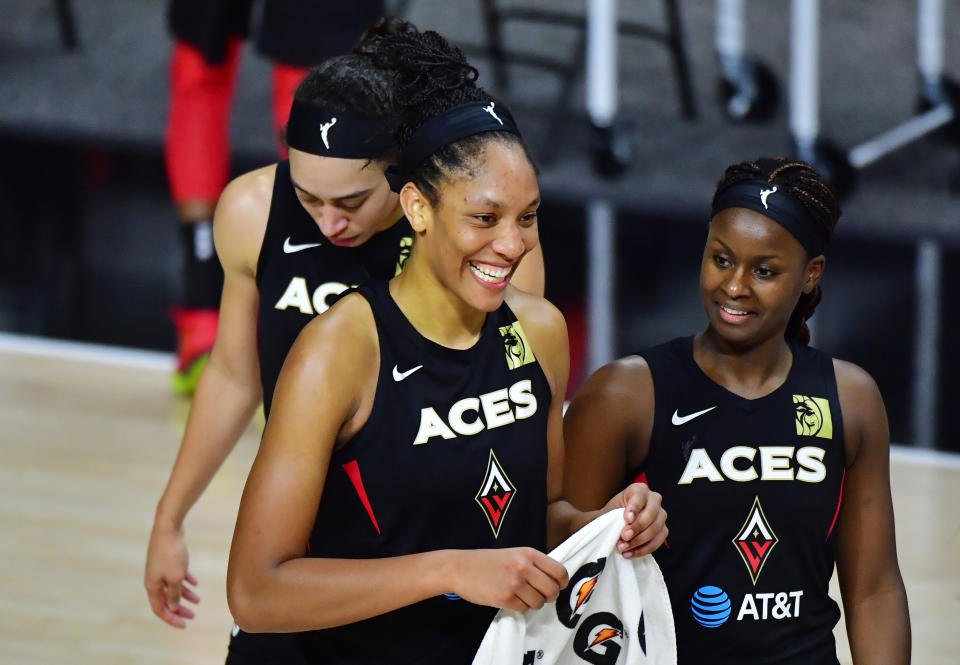 A'ja Wilson and Sugar Rodgers celebrate after a win.