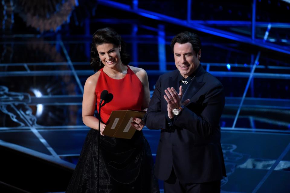 Idina Menzel and John Travolta at the 2015 Oscars.
