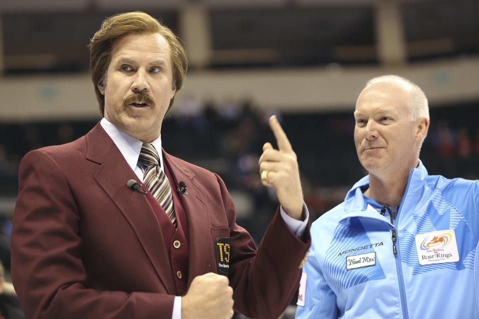 Will Ferrell (L) as Ron Burgundy jokes with Skip Glenn Howard prior to the start of the Roar of the Rings Canadian Olympic Curling Trials in Winnipeg, Manitoba December 1, 2013. REUTERS/Trevor Hagan (CANADA - Tags: SPORT ENTERTAINMENT CURLING)