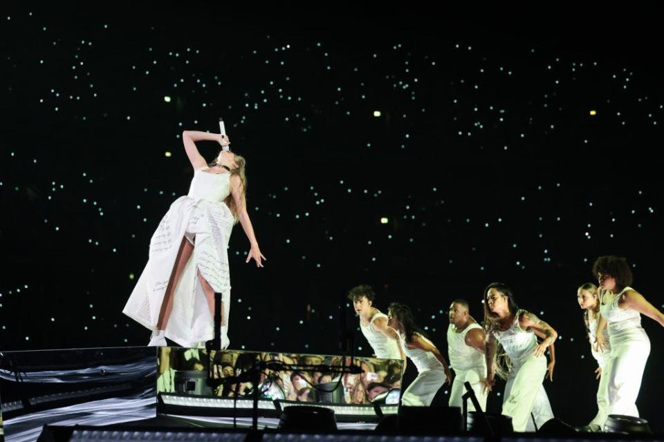 Taylor Swift performing on The Eras Tour