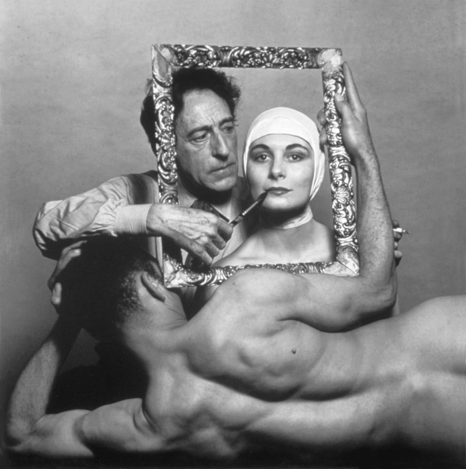 Philippe Halsman captured French poet, artist, and filmmaker Jean Cocteau with actor Ricki Soma and dancer Leo Coleman in New York City in 1949.