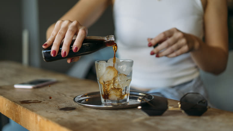 pouring cold brew coffee