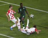 <p>No chance: Mario Mandzukic, right, heads the ball to make Nigeria’s Oghenekaro Etebo score an own goal to give Croatia the lead. (AP) </p>