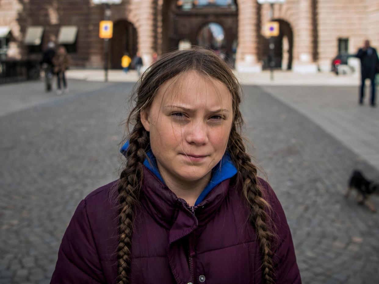 The 16-year-old activist stands strong in the face of harsh criticism by men many years her senior: Getty