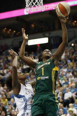 Crystal Langhorne (right) and her Seattle Storm team are one win away from a WNBA championship. The Willingboro High School graduate tries to make the most of her minutes off the bench for the Storm.