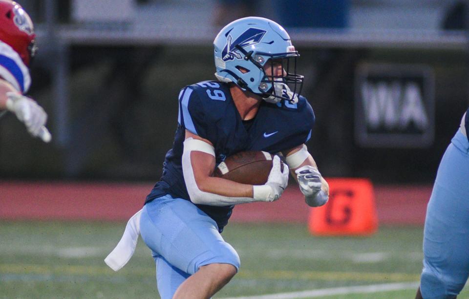 North Penn's Matthew Pownall runs the ball against Neshaminy during their football game in Lansdale on Friday, Sept. 13, 2024.