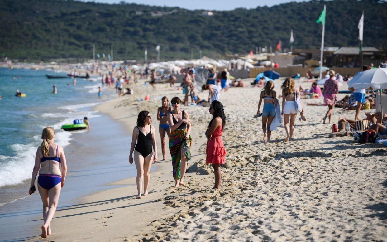 People enjoy Pampelonne beach after France eased lockdown restrictions - but it is now on the new 'amber plus' list - AFP