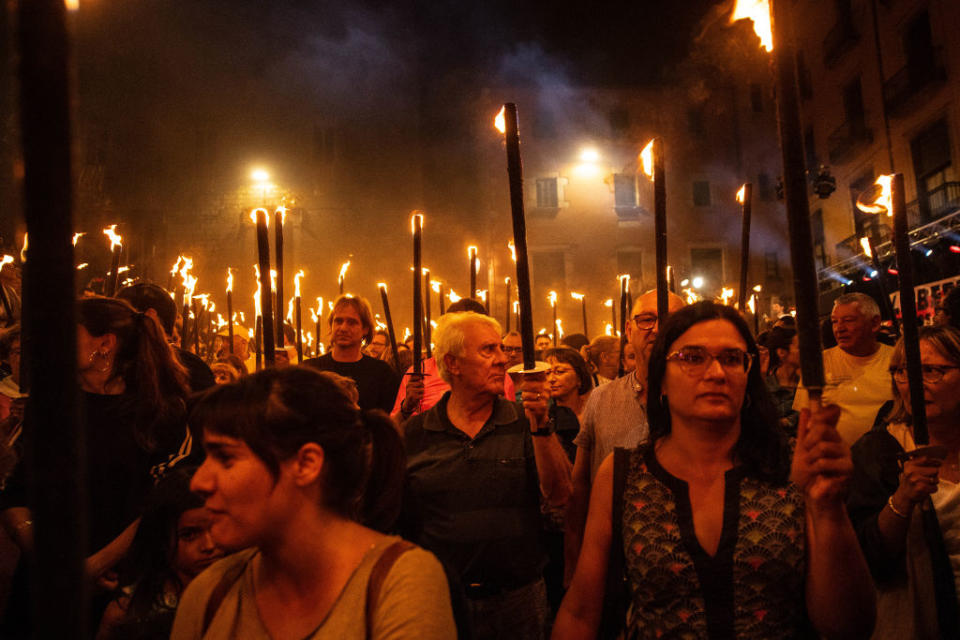 <p>GIRONA, SPAIN – SEPTEMBER 10: Demonstrators march during a Pro-independencce demonstration on September 10, 2018 in Girona, Spain. The Spanish northeastern autonomous region celebrates its National Day on September 11, ahead of the 1st anniversary of the secession referendum held last October 1, which was approved by the Catalan Government and banned by the Spanish government. (Photo by David Ramos/Getty Images) </p>