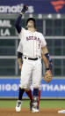 Houston Astros' Carlos Correa celebrates after a double against the Boston Red Sox during the seventh inning in Game 4 of a baseball American League Championship Series on Wednesday, Oct. 17, 2018, in Houston. (AP Photo/David J. Phillip)