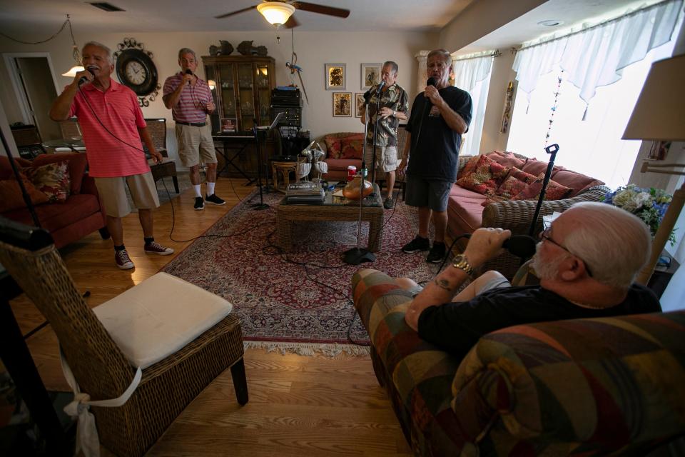 The musical group The Del Prados rehearse at a member's home in Cape Coral. "It’s rewarding getting the harmonies right for each song,” said member Jeff Gaynor.
