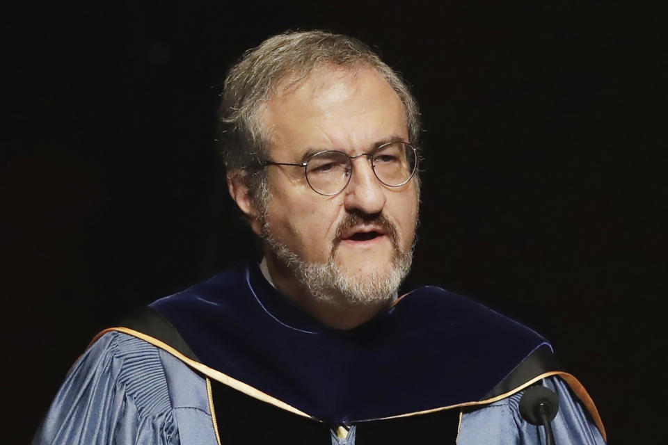 In this Jan. 30 2017, file photo, University of Michigan President Mark Schlissel speaks during a ceremony at the university, in Ann Arbor, Mich. Schlissel has been removed as president of the University of Michigan due to the alleged 