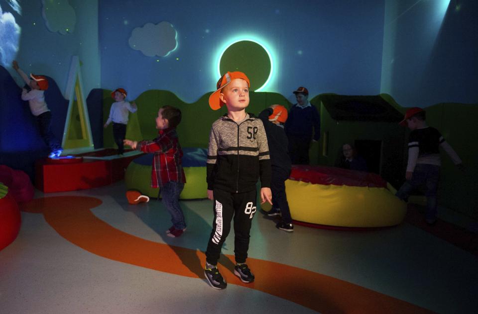 This March 29, 2017 photo shows Ryan Cunningham in the Sensory Room at Shannon Airport in Shannon, Ireland. Shannon is one of several airports offering quiet rooms for travelers on the autism spectrum. (Diarmuid Greene, True Media/Shannon Airport via AP)