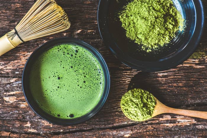 Matcha powder and a latte