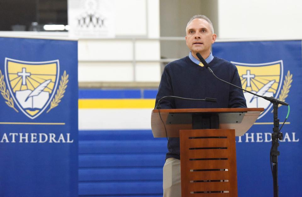Cathedral Athletics Hall of Fame inductee Jeff Hoefs speaks at the ceremony Friday, Feb. 4, 2022, at Cathedral High School.