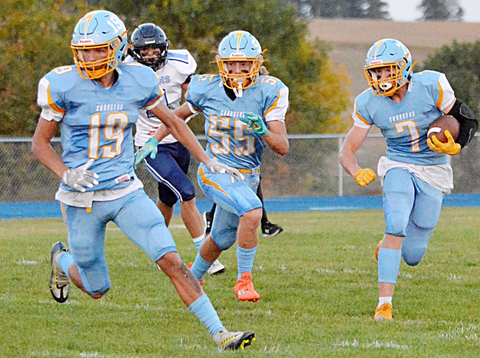 Hamlin's Luke Fraser (7) follows the lead of teammates Zac VanMeeteren (19) and Kadyn Swenson (55) on a sweep during a game against Leola-Frederick Area earlier this fall. The Chargers host Viborg-Hurley on Thursday in a first-round Class 9AA game in the state high school football playoffs.