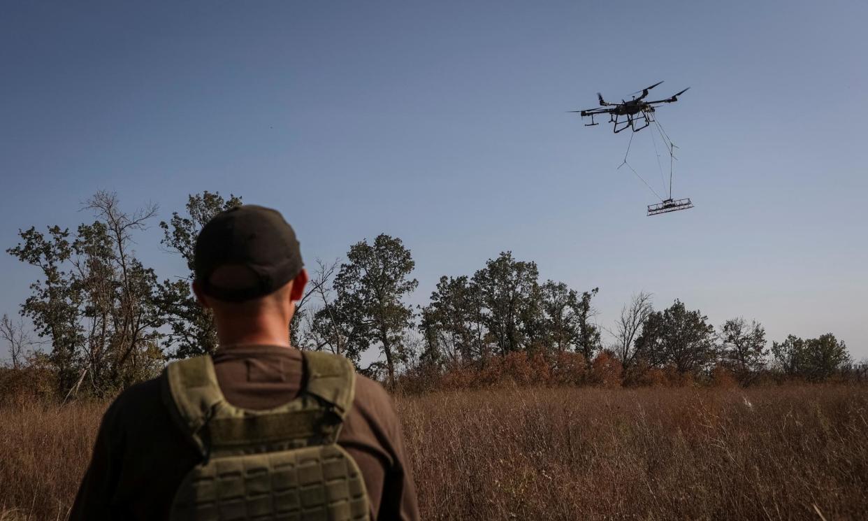 <span>A drone in action. Australia’s military has bought the AIM Defence Fractl:2 anti-drone system.</span><span>Photograph: Reuters</span>