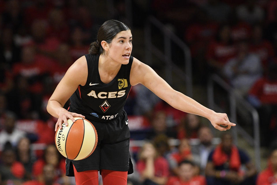 Las Vegas Aces guard Kelsey Plum dribbles the ball against the Washington Mystics during the second half of Game 1 of a WNBA playoff basketball series, Tuesday, Sept. 17, 2019, in Washington. The Mystics won 97-95. (AP Photo/Nick Wass)