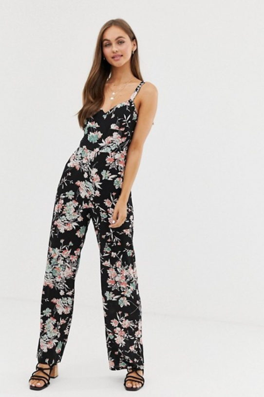 A photo of a model wearing the Brave Soul Cecily floral jumpsuit from ASOS