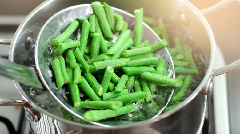 Straining boiled green beans