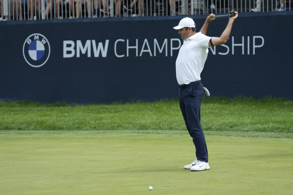 Scottie Scheffler reacts after missing a birdie on the 15th green during the second round of the BMW Championship golf tournament, Friday, Aug. 18, 2023, in Olympia Fields, Ill. (AP Photo/Charles Rex Arbogast)
