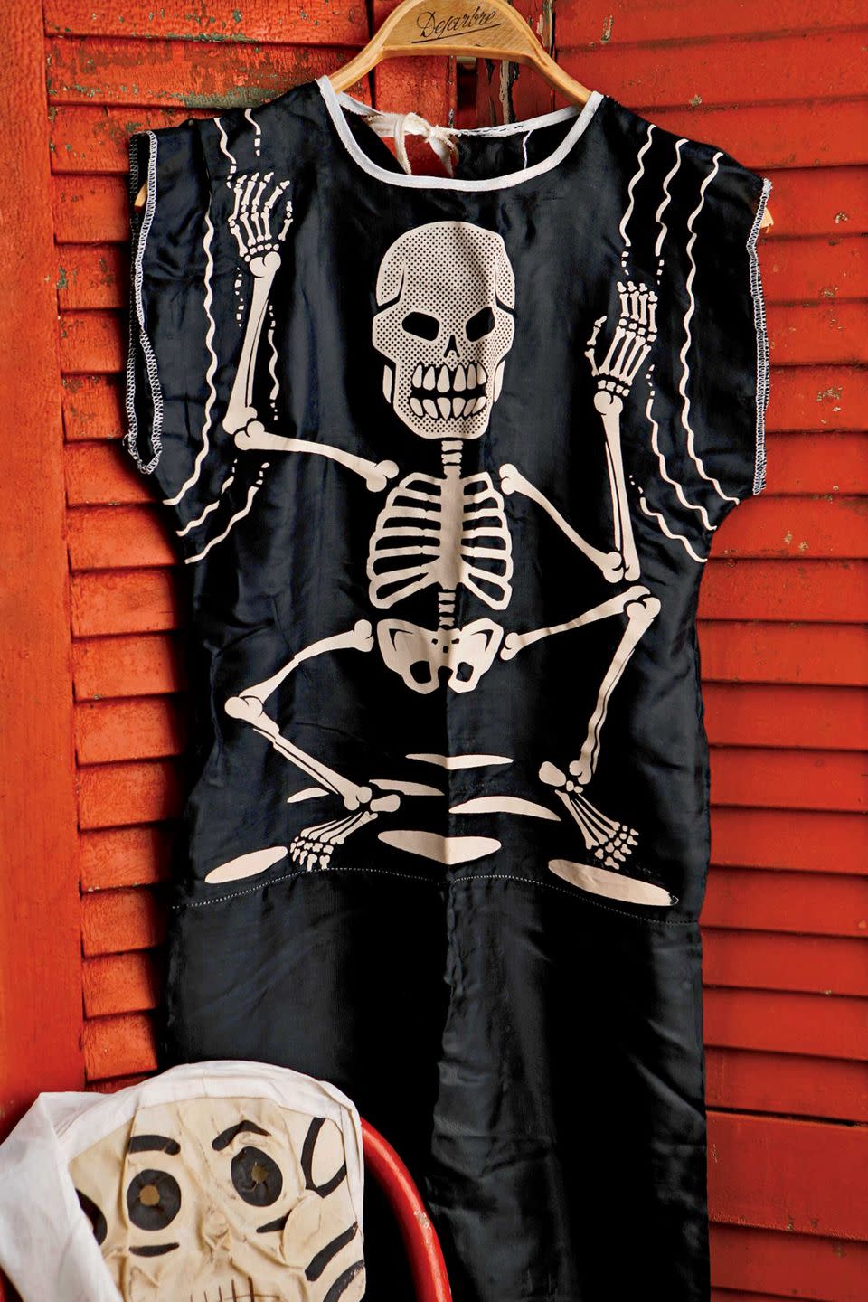 <p>Beginning in the 1940s, manufacturers such as such as Ben Cooper Inc. began making costumes and selling them through Sears, JC Penney, Woolworths, and local five-and-tens for as little as $1.25. This skeleton outfit and hooded muslin mask is from the early 1950s.</p>