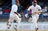 West Indies batsmen Kieran Powell (L) and Adrian Barath (R) run during the second day of the second-of-three Test matches between Australia and West Indies April 16, 2012 at Queen's Park Oval in Port of Spain, Trinidad. AFP PHOTO/Stan HONDA