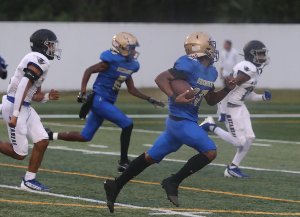 Mainland High's Corey Hill #12 on his way to a touchdown as Matanzas High players give chase, Friday Auigust 18, 2023 in Daytona Beach.
