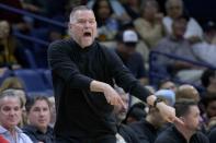 Denver Nuggets head coach Michael Malone yells in the first half of an NBA basketball game against the New Orleans Pelicans in New Orleans, Sunday, Dec. 4, 2022. (AP Photo/Matthew Hinton)