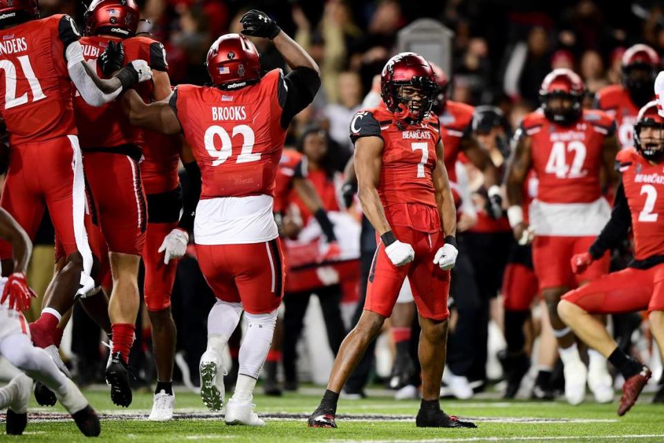 Coby Bryant #7 of the Cincinnati Bearcats celebrates an interception during the second half of the 2021 American Conference Championship against the Houston Cougars at Nippert Stadium on December 04, 2021 in Cincinnati, Ohio.