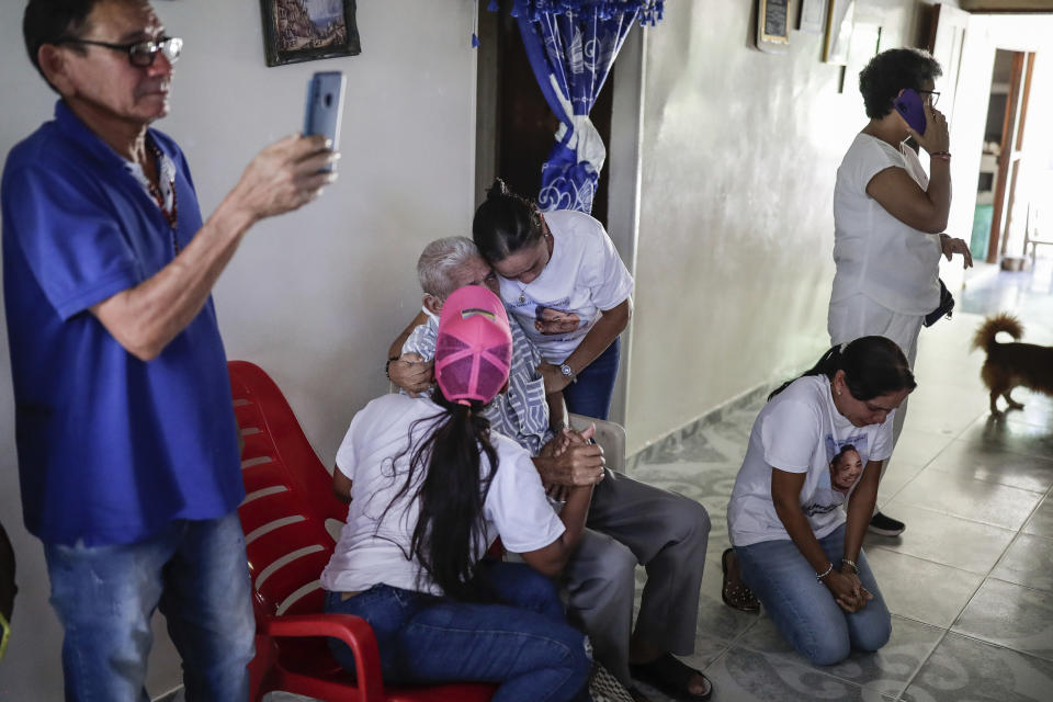 The family of Luis Manuel Díaz waits at their family home to reunite with him in Barrancas, Colombia, after getting the news that he was released by his kidnappers, Thursday, Nov. 9, 2023. Díaz, the father of Liverpool striker Luis Díaz, was kidnapped on Oct. 28 by the guerrilla group National Liberation Army, or ELN. (AP Photo/Ivan Valencia)