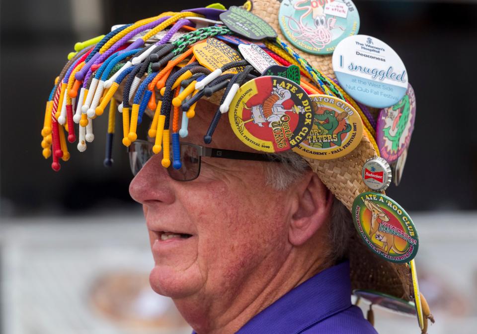 West Side Nut Club member Dan Nix sports a hat full of  memorabilia at the West Side Nut Club's Fall Festival Wednesday afternoon, Oct. 6, 2021.