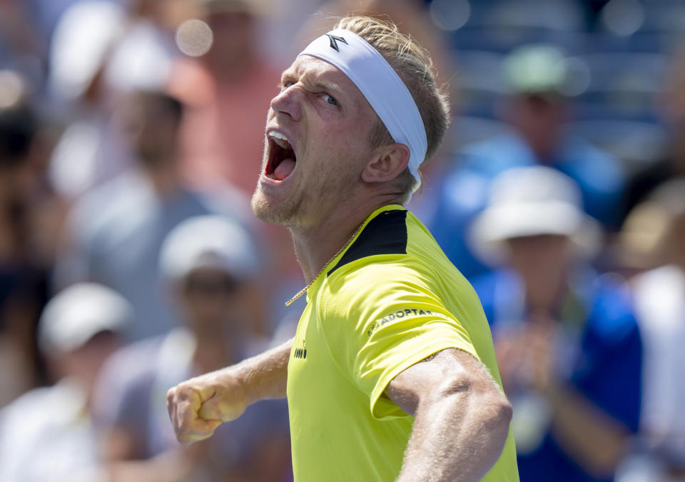 Alejandro Davidovich Fokina, of Spain, celebrates after defeating Mackenzie McDonald in a match at the National Bank Open tennis tournament in Toronto, Friday, Aug. 11, 2023. (Frank Gunn/The Canadian Press via AP)
