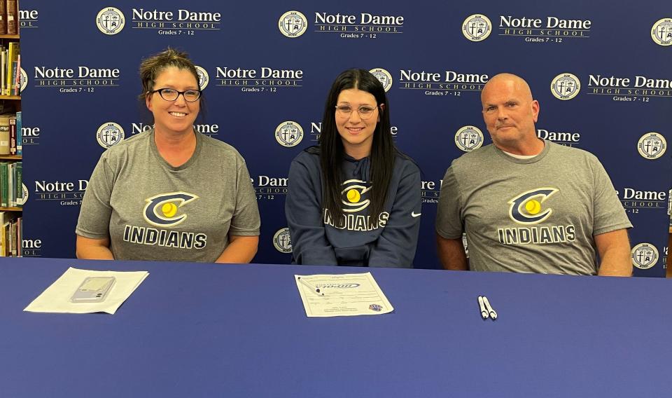 Elmira Notre Dame senior Lawson Bigelow signed to play softball at Chipola College on June 6, 2023. Pictured with her are her parents, Jamie and Kelli Bigelow.