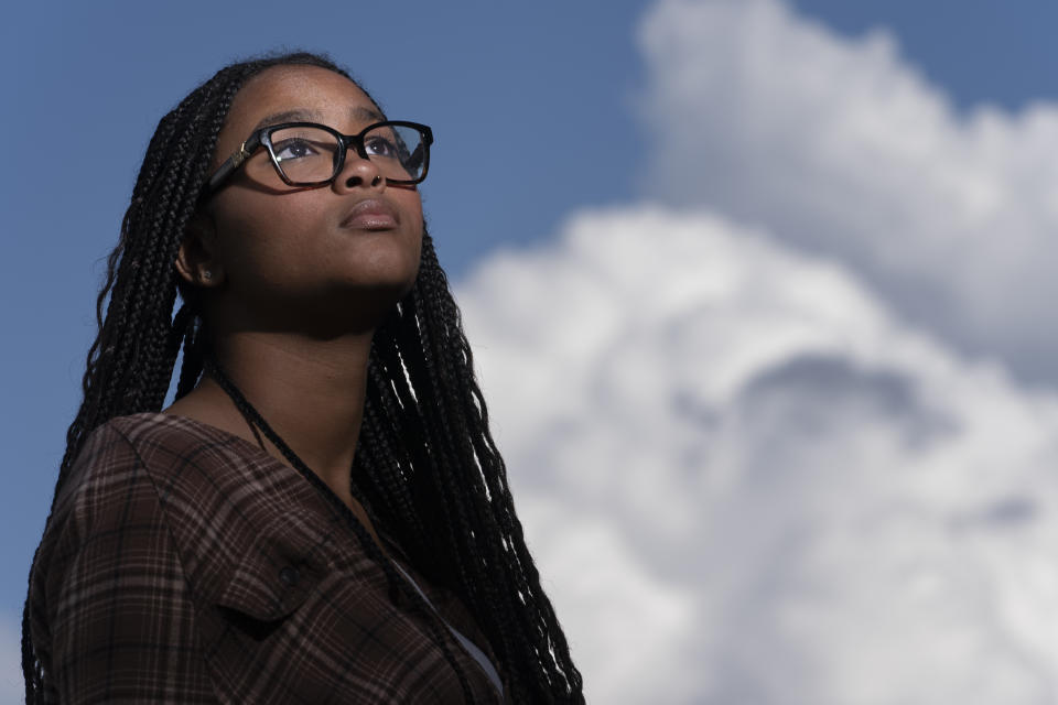 Harmony Kennedy, 16, a high school student, poses for a portrait in Nolensville, Tenn., on Tuesday, May 16, 2023. When the Tennessee legislature began passing legislation that could limit the discussion and teaching of Black history, gender identity and race in the classroom, to Harmony, it felt like a gut punch. "When I heard they were removing African American history, banning LGBTQ, I almost started crying," she says. (AP Photo/George Walker IV)